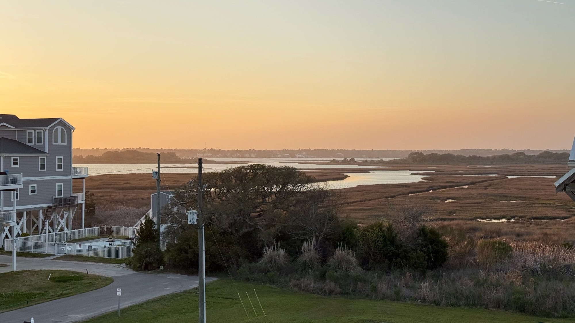 Sunset over the marsh and sound from Topsail Paradise